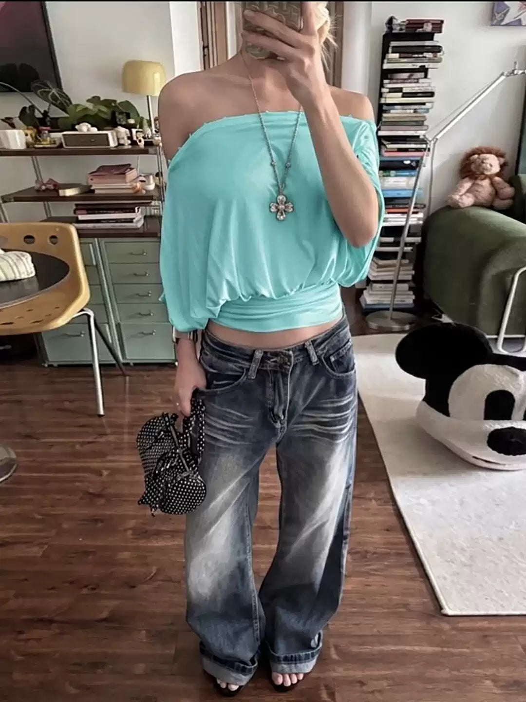 Loose-sleeved short-sleeved T-shirt for women with a slanted shoulder design